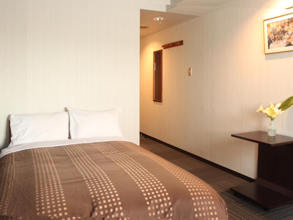 Hotel Livemax Budget Tokyo Hamura Ekimae Номер фото